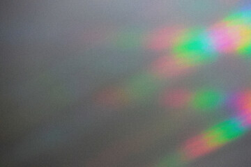 Blurred overlay effect for photo and mockups. Wall texture with organic drop diagonal shadow and rays of light on a white wall.