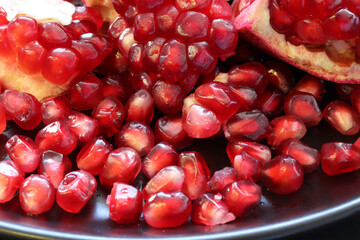 a pomegranate in a plate