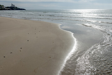 Sandy beach of medieval small touristic coastal town Sperlonga and sea shore, Latina, Italy