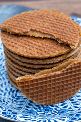 Traditional Dutch sweet dessert, Butter caramel syrup waffles, fresh baked