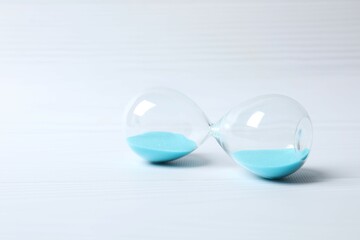 Modern hourglass on white background. Hourglass time concept for business deadline, urgency and...