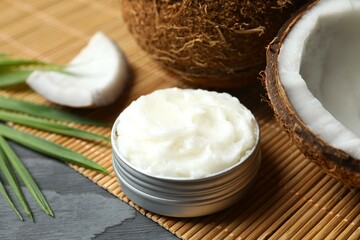 Jar of coconut oil on table