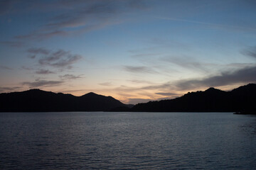 Panorama of golden hour at the Turquoise Coast Turkey with islands as black silhouette