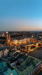 aerial view over central square of krakow in evening at sunset in poland