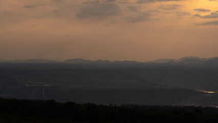 Beautiful natural scenery of a public park, sunset view with mountain ranges at Mae Moh mine, Lampang Thailand.