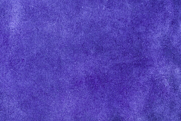 Purple suede background. Suede leather macro photo purple.