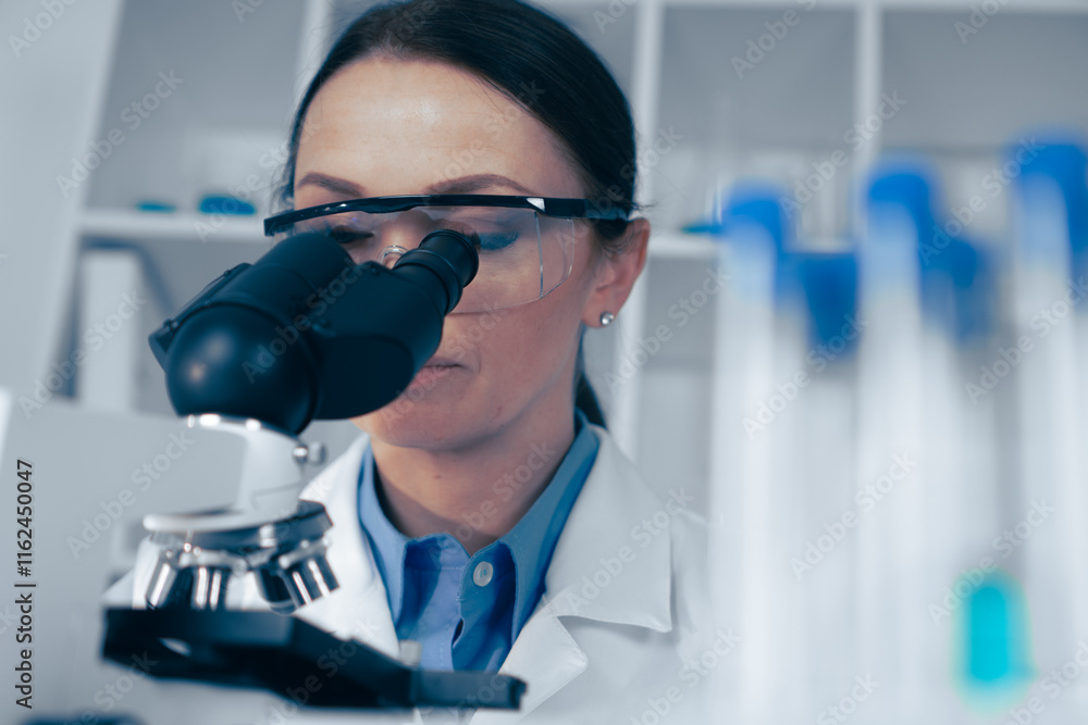 Aufkleber A dedicated scientist meticulously analyzing a specimen through a microscope in a stateoftheart modern laboratory, contributing significantly to the fields of biochemistry and biology