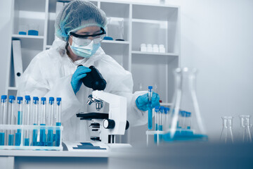 In a contemporary laboratory setting, a researcher is diligently analyzing various samples. This work encompasses multiple fields such as biomedical science, biotechnology, and chemistry