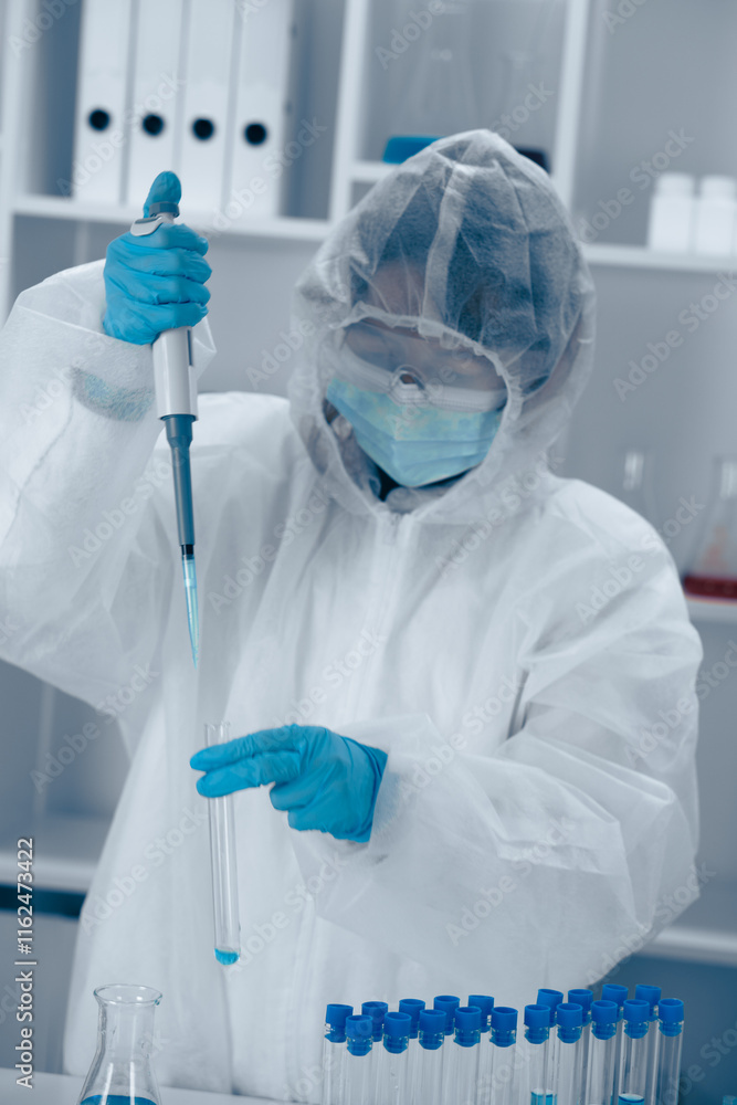 Poster A skilled Laboratory Scientist is meticulously conducting precise liquid handling using a pipette, showcasing their expertise in biotechnology and chemistry in a research environment