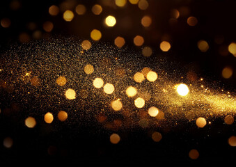 黒い背景にキラキラ輝く金色の光