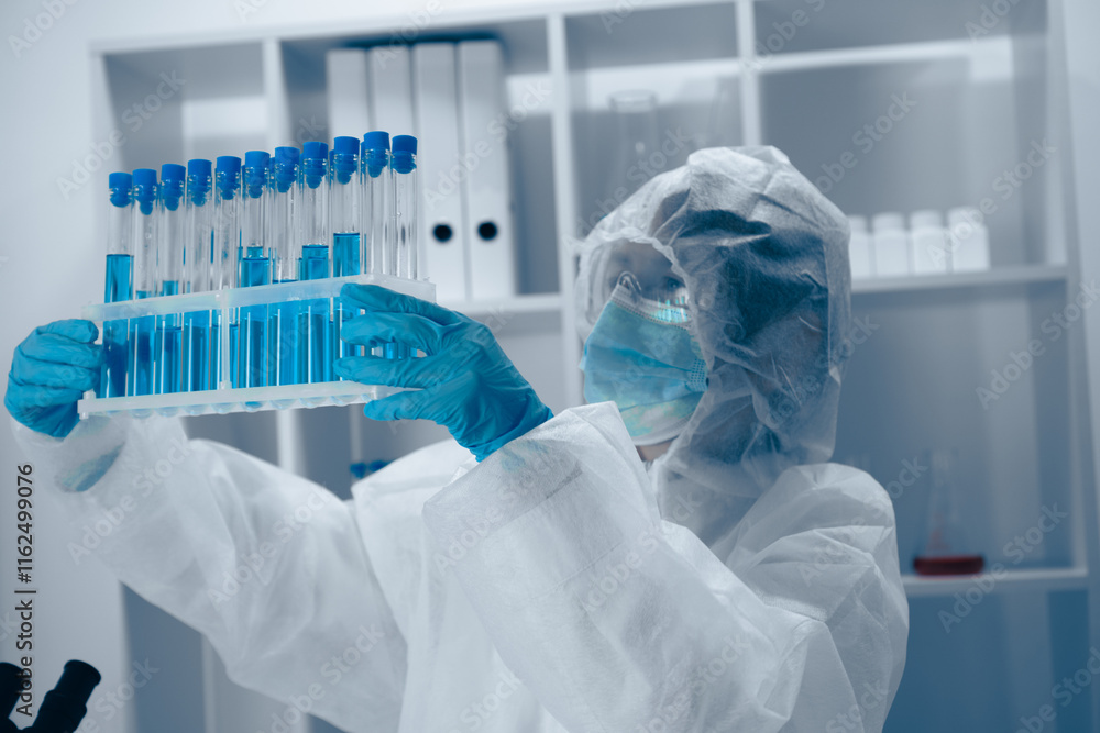 Aufkleber In a wellequipped lab, a devoted scientist analyzes test tubes, focusing on details of an experiment that could lead to groundbreaking innovations in healthcare and improve patient outcomes