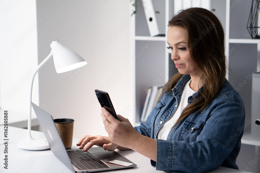 Poster A skilled professional navigates a wellorganized workspace with a stateoftheart laptop and smartphone, greatly enhancing their productivity and effectiveness throughout the day