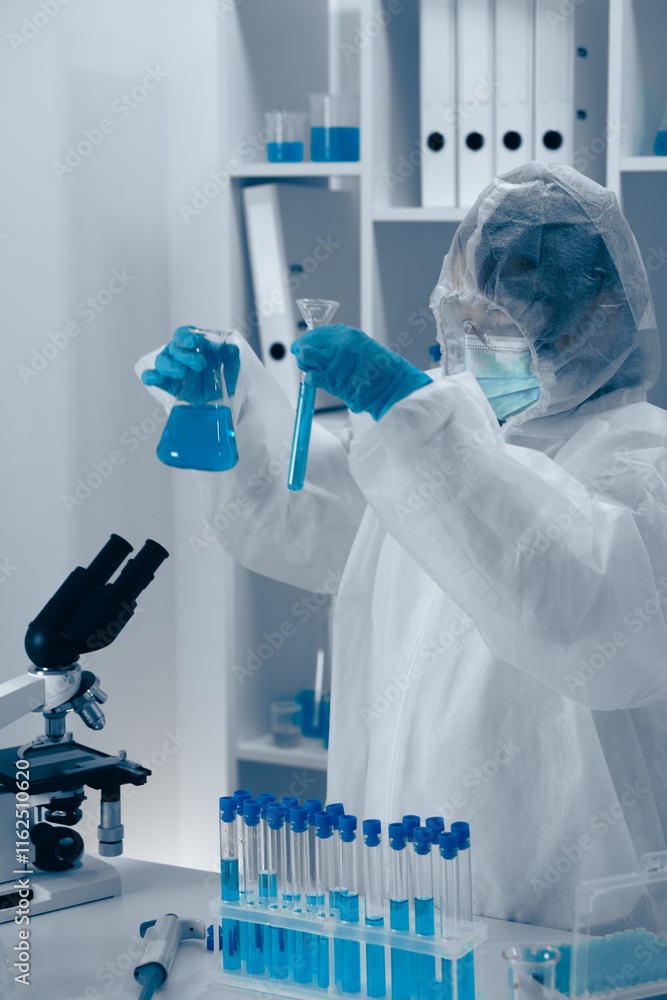 Poster a dedicated scientist conducts detailed experiments in a fully equipped lab with specialized glasswa
