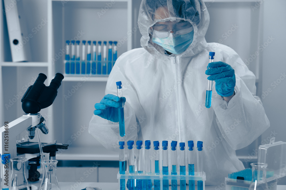 Poster Currently, important laboratory research is underway a dedicated scientist is meticulously analyzing various samples to gather significant data and insights in their field of study