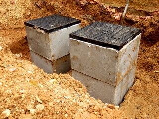 New septic tank inspection hatches being installed
