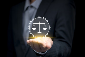 business ethics concept Businessman holds ethics icon for ethical corporate culture. Business honesty and morality legal concept.