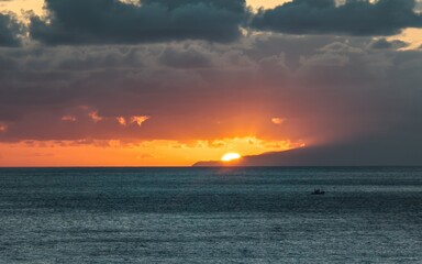 Sunset above cloudes. 