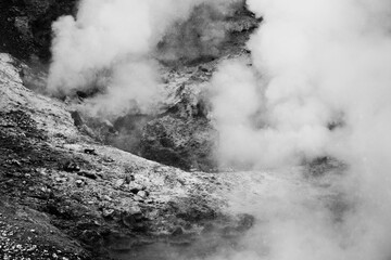 boiling water in the hot springs in black and white