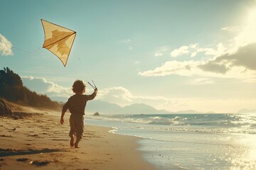 Child running on beach flying kite sunset