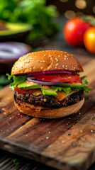 Delicious black bean burger with avocado served on wooden table in cozy diner