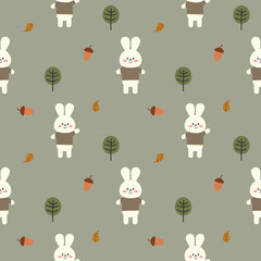 Obraz premium Rabbit cartoon so cute. On acorn tree leaf green background. Pattern seamless vector illustration. 