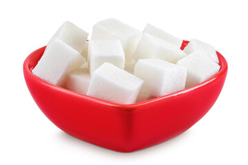 Sugar cubes in a ceramic bowl isolated on white background