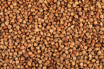 Raw buckwheat as a background. Top view. Flat lay