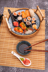 Soy Sauce: Used to dip the nigiri before eating.