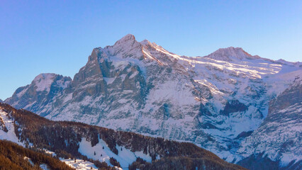 Mountain landscape with view of the peaks of the Wetterhorn. Grindelwald, Switzerland