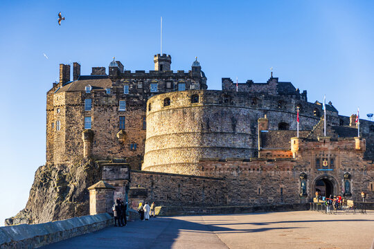 Edinburgh Castle on the top of the hill at sunset