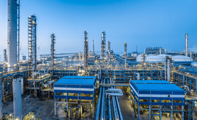 Oil refinery and chemical plant in large industrial area at dusk. Business Finance and Industry