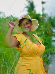 young woman in a hat