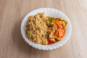 Chinese recipe for rice with chicken, vegetables and soy sauce