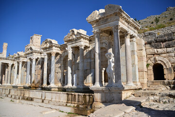 a part of an ancient theatre with columns and statues Sagalassos Turkey