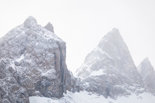 Aiguilles d'Arves covered by snow with mist and clouds