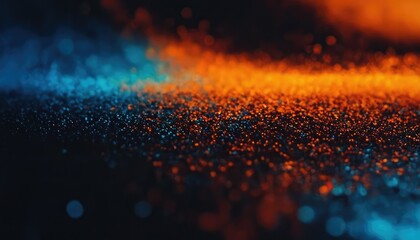 A close up of a black surface with the blue and green colors of the paint
6