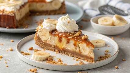 Deliciously rich banoffee pie slice adorned with whipped cream and caramel drizzle on a rustic plate