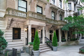 Elegant old townhouses or apartment buildings in French Beaux-Arts style in Upper East Side area of Manhattan historic district