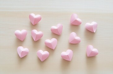Obraz premium Lovely Pink Paper Hearts on Wooden Background: Valentine's Day, Romantic, Cute