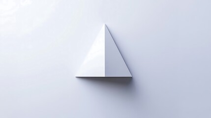 Minimalist white triangular pyramid on a white background.