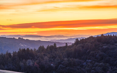 Breathtaking, beautiful sunrise view in mountains Silicon Valley, dreamy backdrop for trekking enthusiasts. Travel moment captures natures harmony and the allure of morning light in California's hills