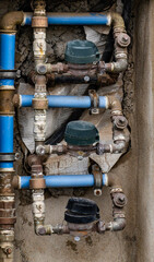 Three pipes with valves on them