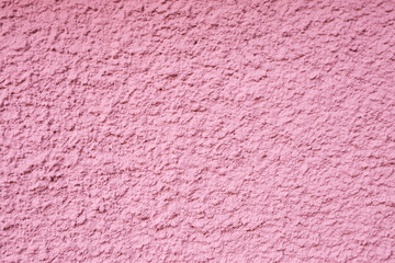 Fototapeta premium Abstract background of uneven, old plaster on the wall.