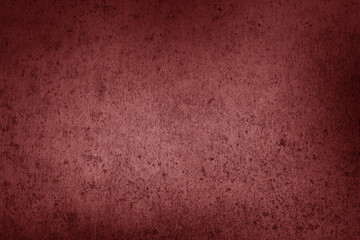 Fototapeta premium Dark red textured concrete surface with rich, deep tones