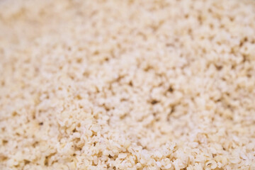 Healthy food with the ability to copy. Selective focus on the side dish. Boiled bulungur in close-up. High quality photo