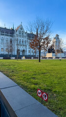 Fototapeta premium The historic Gothic architecture of the Hungarian Parliament Building in Budapest, captured on a bright winter day, evokes concepts of political history and European heritage