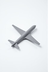 A gray model airplane on a white background