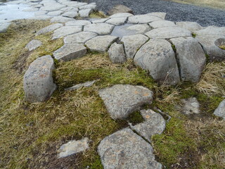 Some geometric shaped stones in Iceland, Kirkjugolf basaltic columns on the ground
