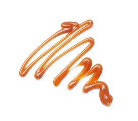 Liquid caramel syrup close up isolated on a white background