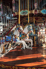 Carousel with colorful horses, Merry go round with horse, Vintage ride attraction for children